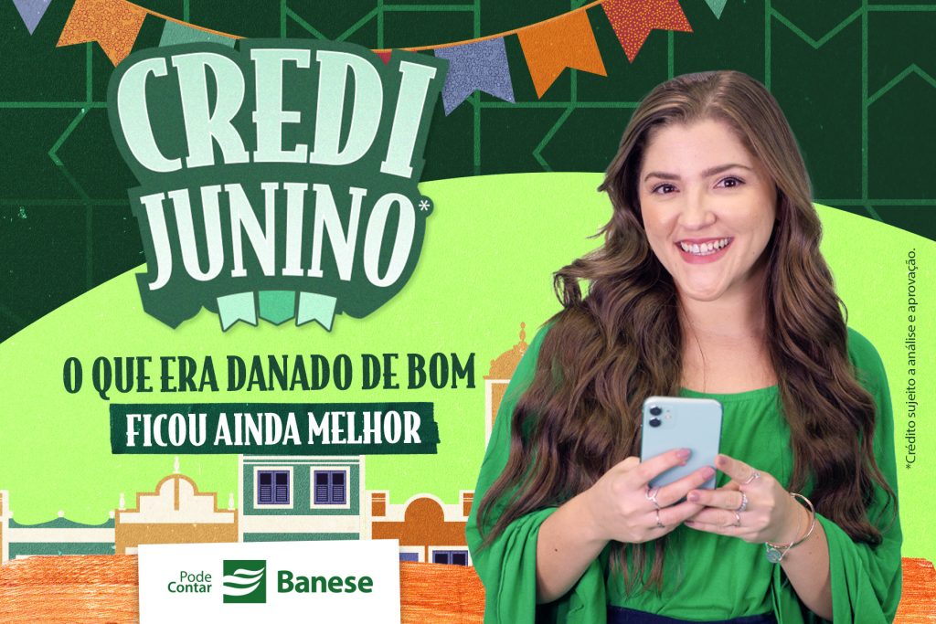 Arte de divulgação do Credi Junino do Banese. Com fundo em dois tons de vende, e bandeirolas juninas na parte superior. No centro, lê-se o nome Credi Junino e, logo abaixo, a frase "O que era danado de bom ficou ainda melhor". No lado direito, uma modelo de pele branca e cabelos castanhos claros sorri, enquanto segura um celular com as duas mãos. Embaixo, está logomarca do Banese.